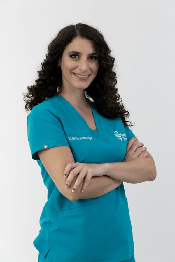 Illustrative stock portrait for fictional Dr. Maya Khan